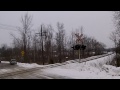 cp 255 w cefx 1023 u0026 cp 8631 lead this wb mixed freight train thru the concession rd 14 crossing