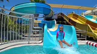 Indoor Waterpark | Child on a Water slide in the Water Park