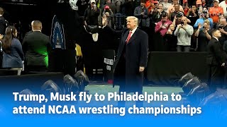 President Donald Trump attends NCAA wrestling national championships in Philadelphia with Elon Musk