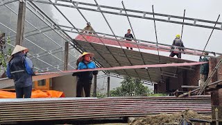 It rained but the girl and the worker still completed the house to hand over.