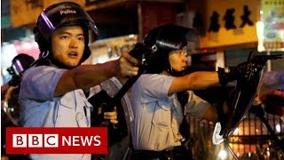 Hong Kong: What led to a single gunshot being fired? - BBC News