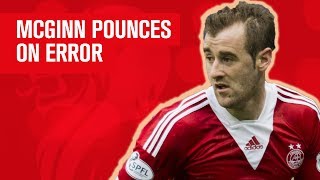 McGinn punishes howler to bring Dons level