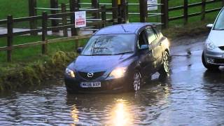 vehicles crossing a flooded ford 2016 - river crossing