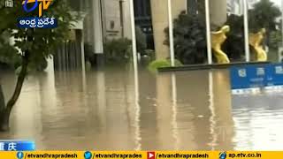 Heavy Rains, Floods | in China | Strand Dozens on Rooftops, Triggering Landslides