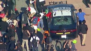 Black Lives Matter protesters smash window of CHP cruisers near downtown LA I ABC7
