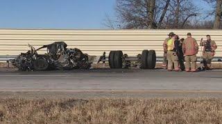 Semi-truck collides with abandoned car off I-69