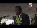 Zimbabwe president promises inquiry into deadly post-election violence