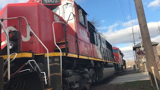 A CN power move through West Chicago with a ex-IC SD70