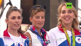 Russian athletes return home after the Tokyo Olympics and sing the national anthem on Red Square