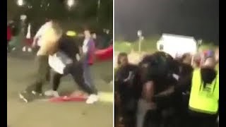 Shocking moment a football game erupts into an all in brawl as dozens of punters throw punches