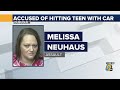 dubuque woman charged for hitting a teen with her car and driving off with teen still on the hood