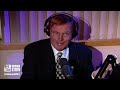 adam west brings his original “batman” cowl to the stern show studio 1994