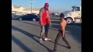 Small Man Tries To Fight 7 ft Tall Giant