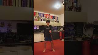 Guy Demonstrates Bo Staff Backspin Trick - 1278195