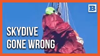 Skydiver Left Hanging By A Thread From Powerlines