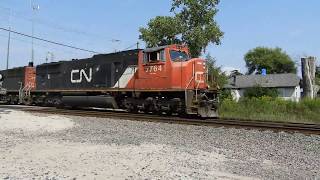 CN 5764 and CN 5710 2 SD75I's lead a manifest south in Elgin IL