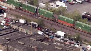 LIVE: Thieves looting freight train on West Side