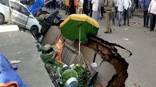 Hyderabad: Vehicles damaged as portion of road caves in at Goshamahal, investigation on