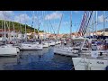 two sailboats leaving the harbor of korcula croatia