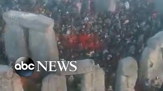 Crowds gather at Stonehenge for summer solstice