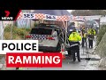 Victoria Police officers fired shots while their car was rammed in a suburban laneway | 7NEWS