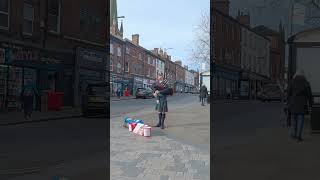 Bagpiper in Wakefield: Cock O' the North