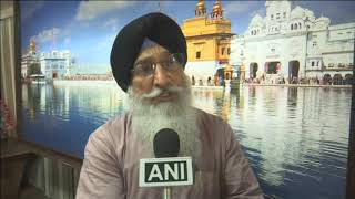 Devotees relish special dishes at community kitchen of India's Golden Temple