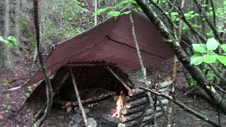 Protecting A Campfire From The Rain