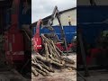 biber 80 fendt 930 vario in abroll container wood chips