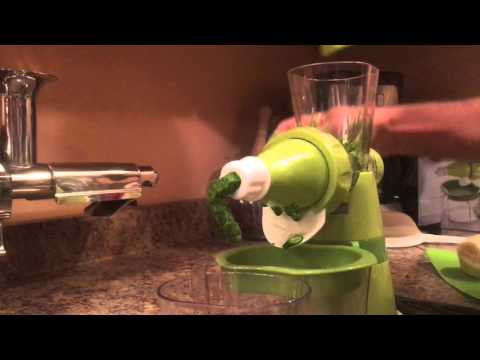 Making wheatgrass juice with manual juicer Making wheatgrass juice with manual juicer