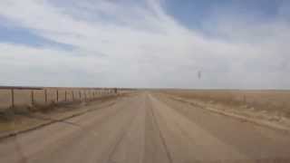 A long drive down a dirt road in western Kansas