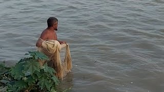 Chela fish hunting by cast net on padma river