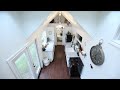 vintage glam tiny house raises the roof