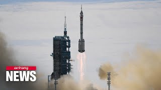 Astronauts enter space station core module after docking of Shenzhou-12