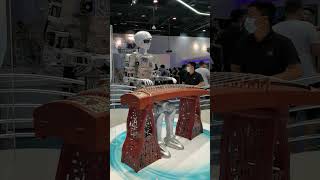 A robot zitherist plays the Chinese traditional instrument called guzheng