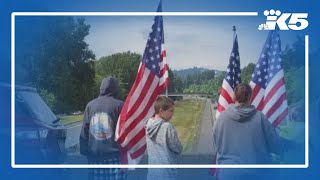 Residents mourn Longview victims as procession delivers their bodies home