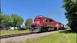 HLCX 6337 leads a long and slow WSOR T006 through McFarland, WI