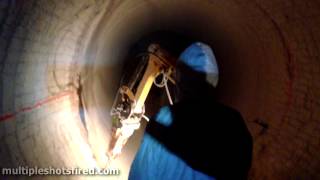 Brick demo inside rotary kiln using Brokk Demolition Machine