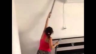 WhatsApp Video: Funny lady trying to clean through \