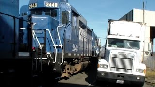 Railroad Running Down middle of BUSY Port Street ! Ex BNSF Santa Fe GP30 !  Street Running !