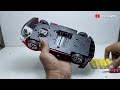 unboxing police car toy can run and emit sound and 3d light on the glass side bump and go action