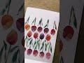 layered watercolor tulips for your sketchbook that look like stained glass