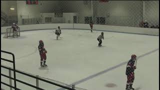 Jace Hartman, #3 center Hoosac School, wins a faceoff that leads directly to a scoring chance.