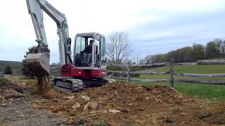 Takeuchi TB153 Mini Excavator Backfilling Trench