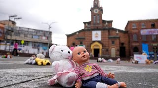 Hundreds of toys displayed in a Bogota square to highlight sexual abuse in Colombia