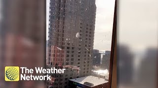 It's raining ice chunks in downtown Toronto, the loud sounds are concerning