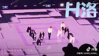 R1SE spells out members name during a dance at their farewell concert