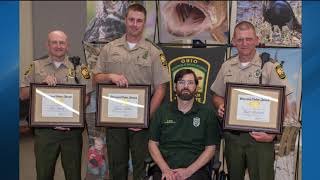 Conservation officers honored for saving peer who was shot