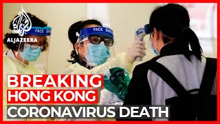 Coronavirus death in Hong Kong, as China admits 'shortcomings'