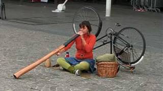 Lady with a Didgeridoo on place Beaubourg Paris